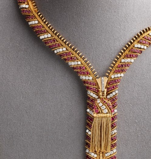 Lot 227 VAN CLEEF & ARPELS RUBY AND DIAMONDS TRANSFORMABLE ‘ZIP’ NECKLACE.