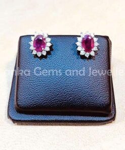 Pair of Ear-rings with Ruby and Diamonds set in 9k Yellow Gold