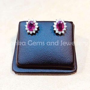 Pair of Ear-rings with Ruby and Diamonds set in 9k Yellow Gold