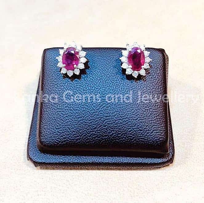 Pair of Ear-rings with Ruby and Diamonds set in 9k Yellow Gold