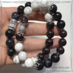 Set of Bracelets made of Howlite, Hawk Eye and Garnet