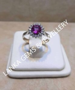 Ring with vibrant Pink Sapphire and Diamonds set in 18k White Gold