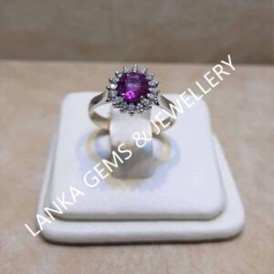 Ring with vibrant Pink Sapphire and Diamonds set in 18k White Gold
