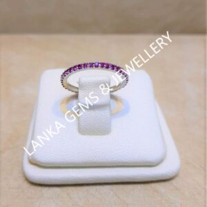 Eternity Ring with Pink Sapphires set in 14k White Gold