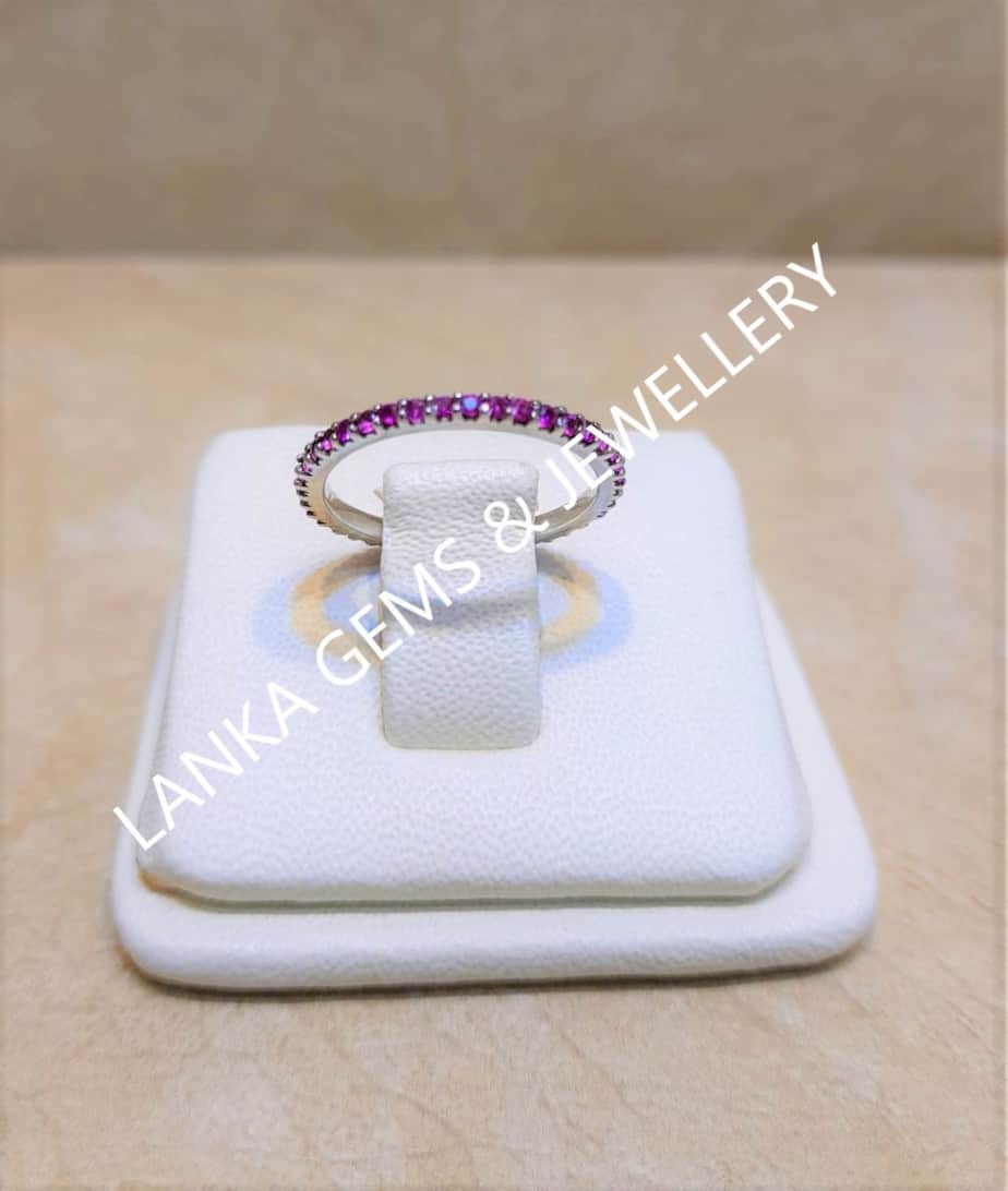 Eternity Ring with Pink Sapphires set in 14k White Gold