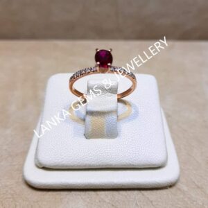 Ring with Ruby Gemstone and Diamonds set in 14k Rose/Red Gold