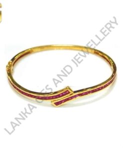 Bangle with Pink Sapphires set in 18k Yellow Gold